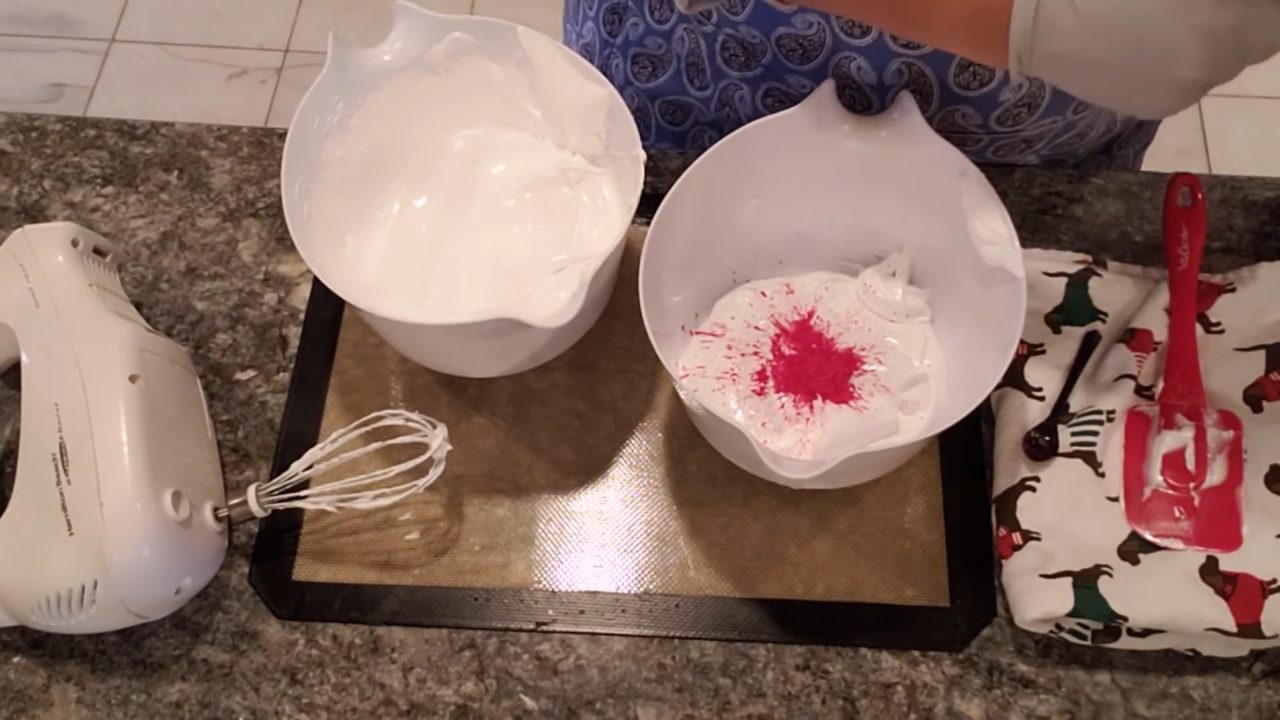 Adding red mica to half of the whipped soap