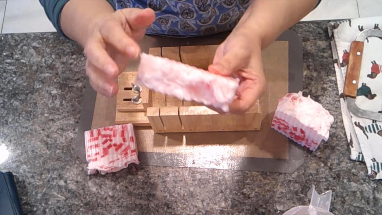 Cutting the frosted peppermint soap