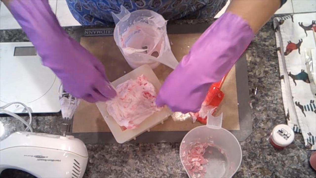 Spreading whipped soap frosting on top