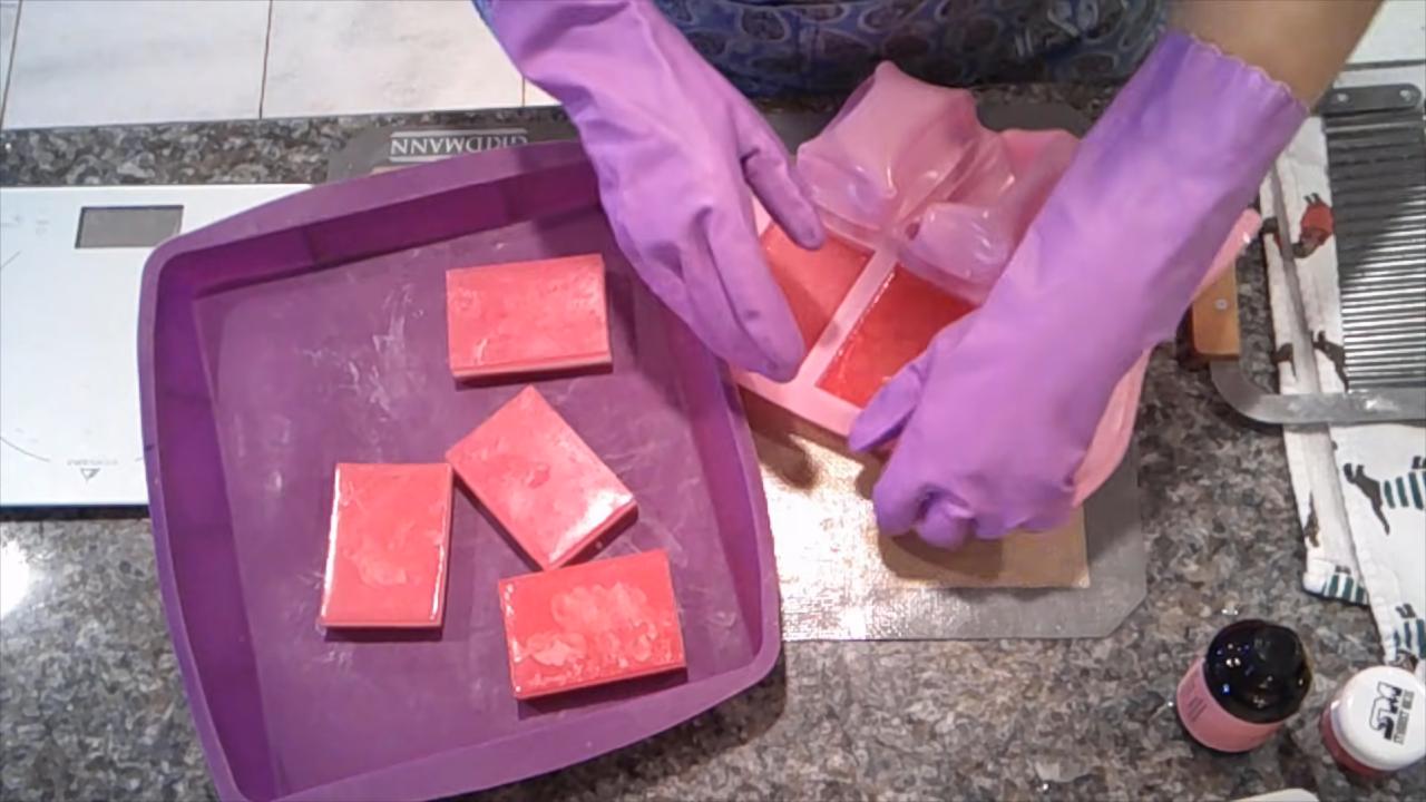 Unmolded red and white layered soap bars