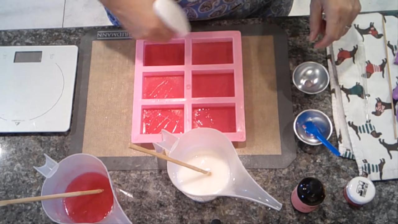 Pouring the white shea butter layer