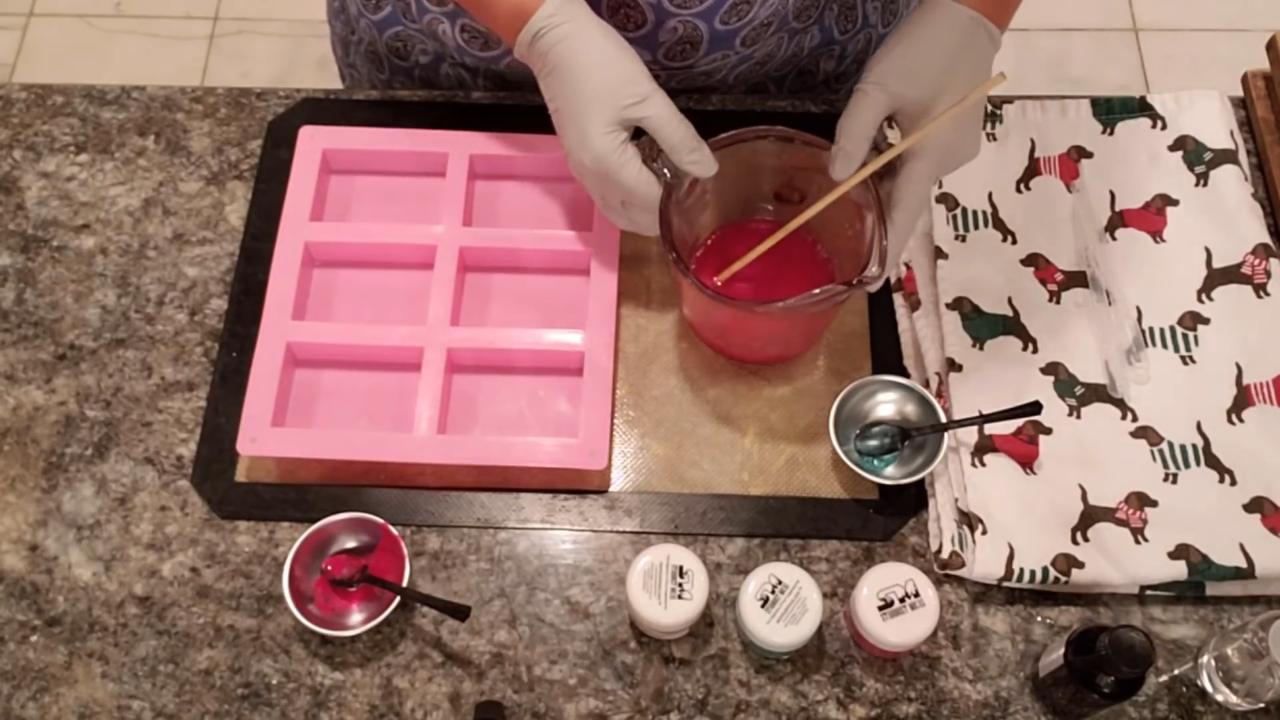 Mixing red mica into clear melt and pour soap