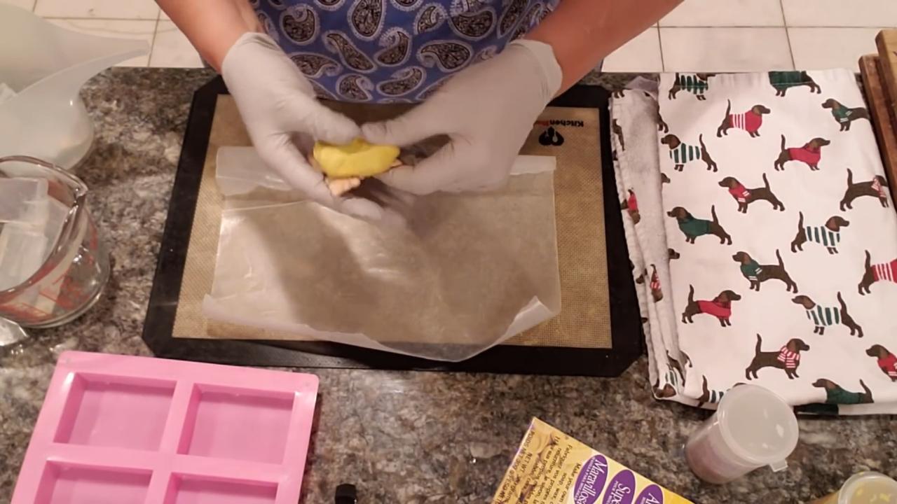 Pressing mold putty over the wood applique