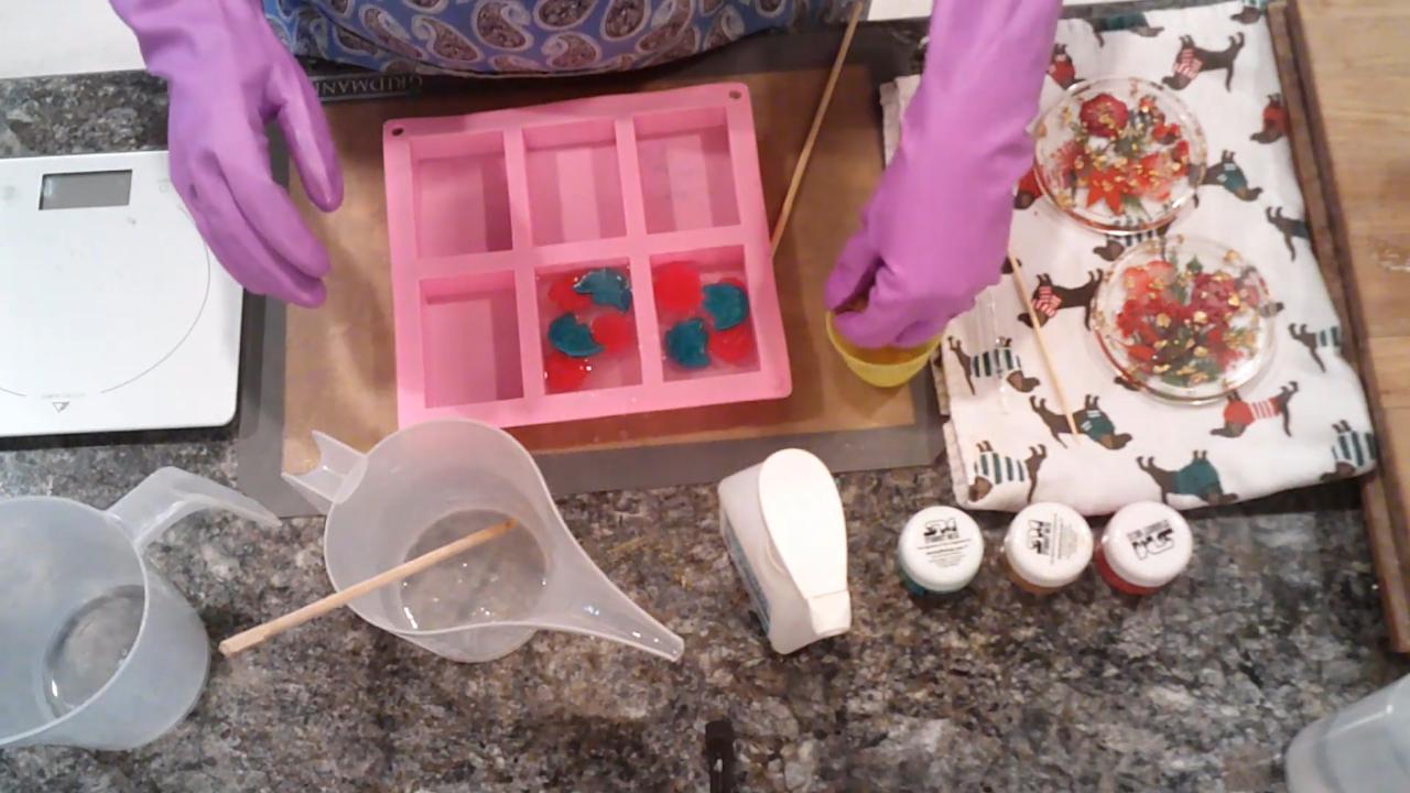Rose, leaf and gold embeds set in clear soap