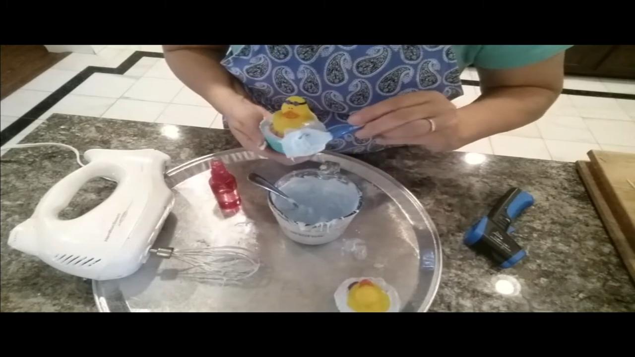 Scooping whipped soap into curly shavings