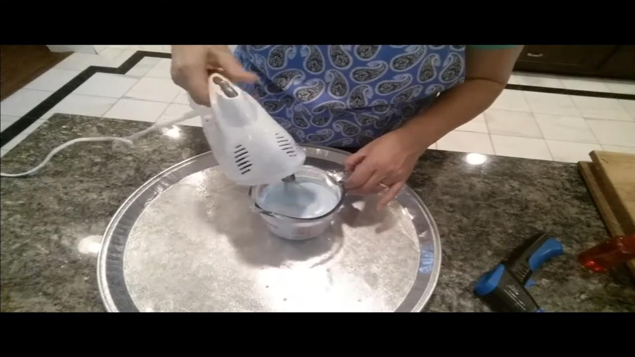 Whipping aqua soap with a hand mixer