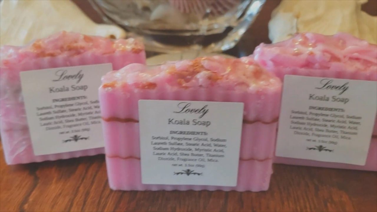 Finished shrink wrapped melt and pour soap bars with ingredient labels