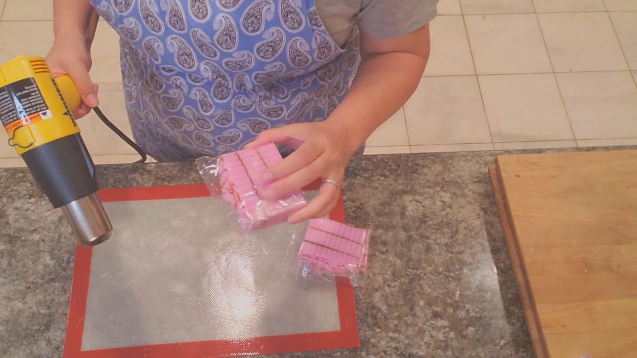 Shrinking the wrap around soap bars with a heat gun