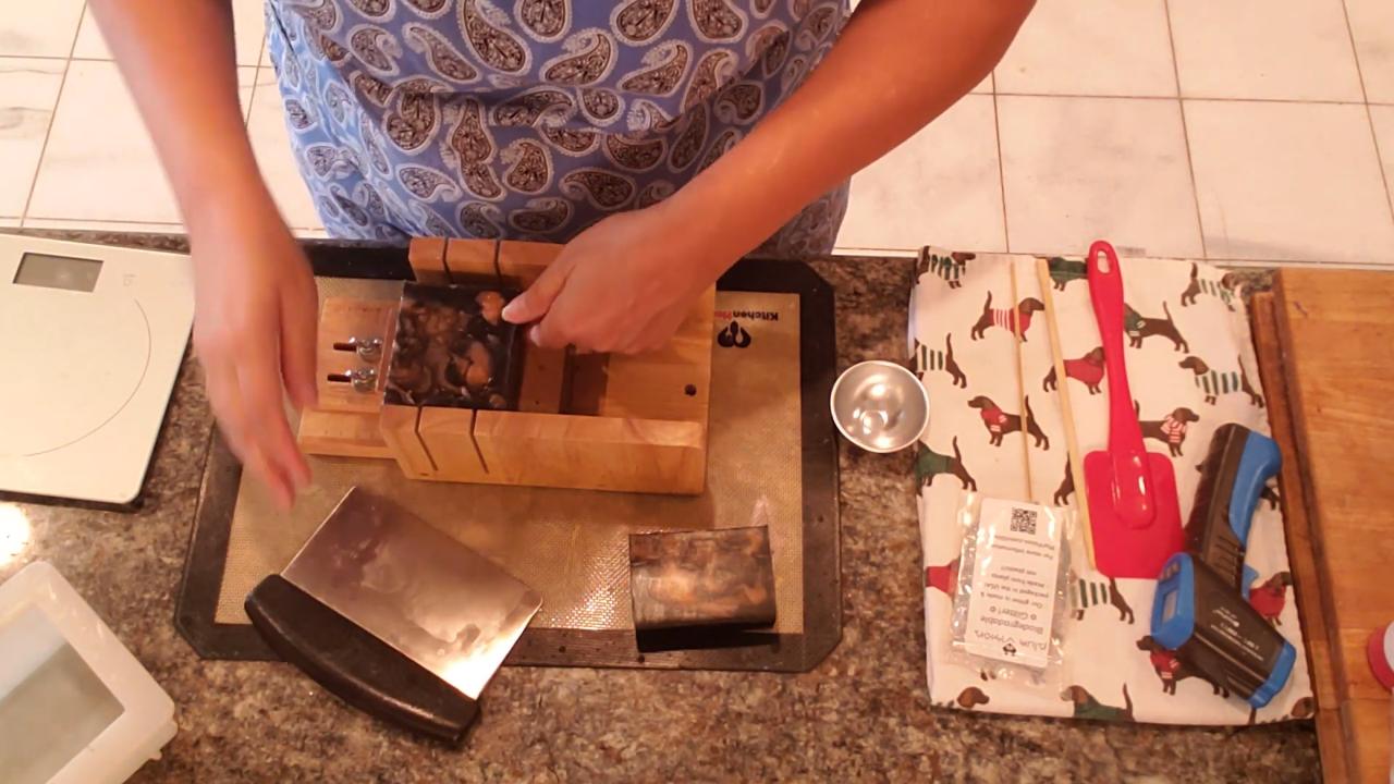 Cutting the spooky swirl soap loaf