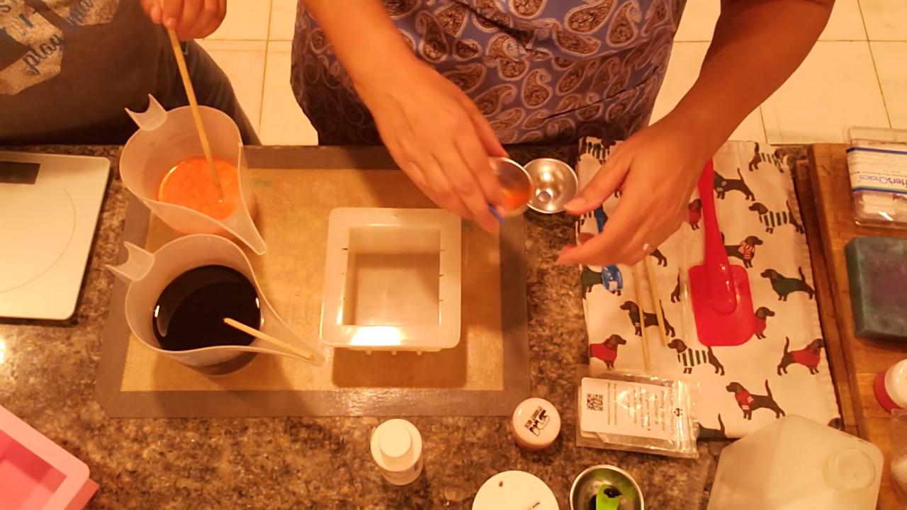 Mixing orange mica into melted soap