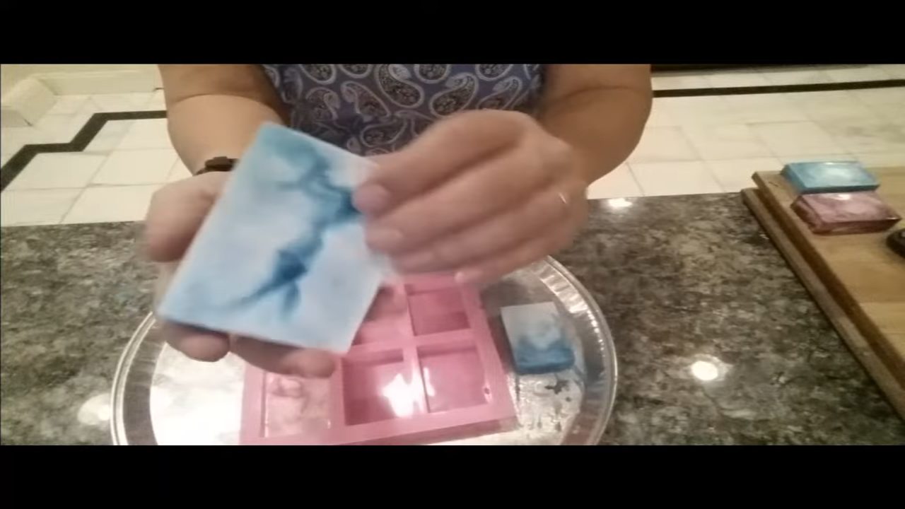 Unmolded blue marbled swirl melt and pour soap bar