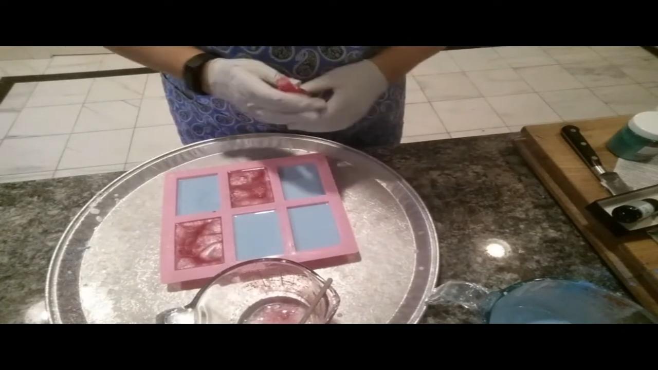 Mold filled with blue and pink soap