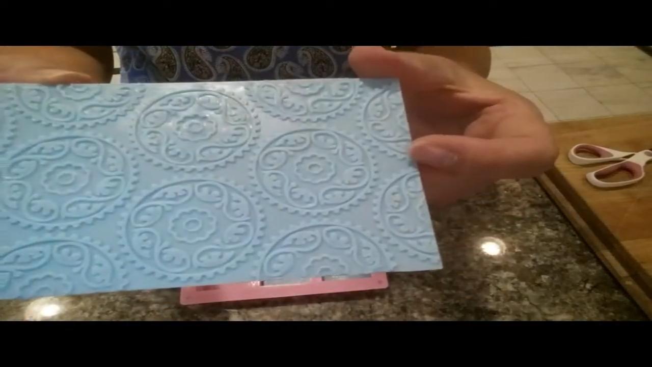 Silicone texture sheet with a raised pattern