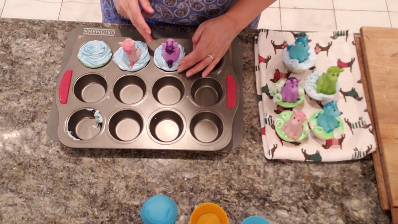Finished unicorn cupcake melt and pour soaps with three different toppings