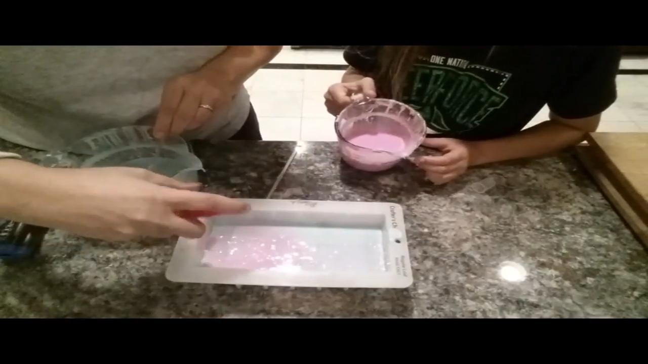 Pink and green soap stripes in the mold