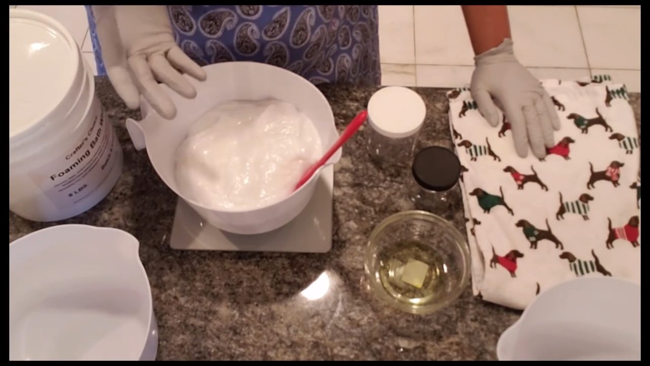 Weighing foaming bath whip base in a bowl on a digital scale