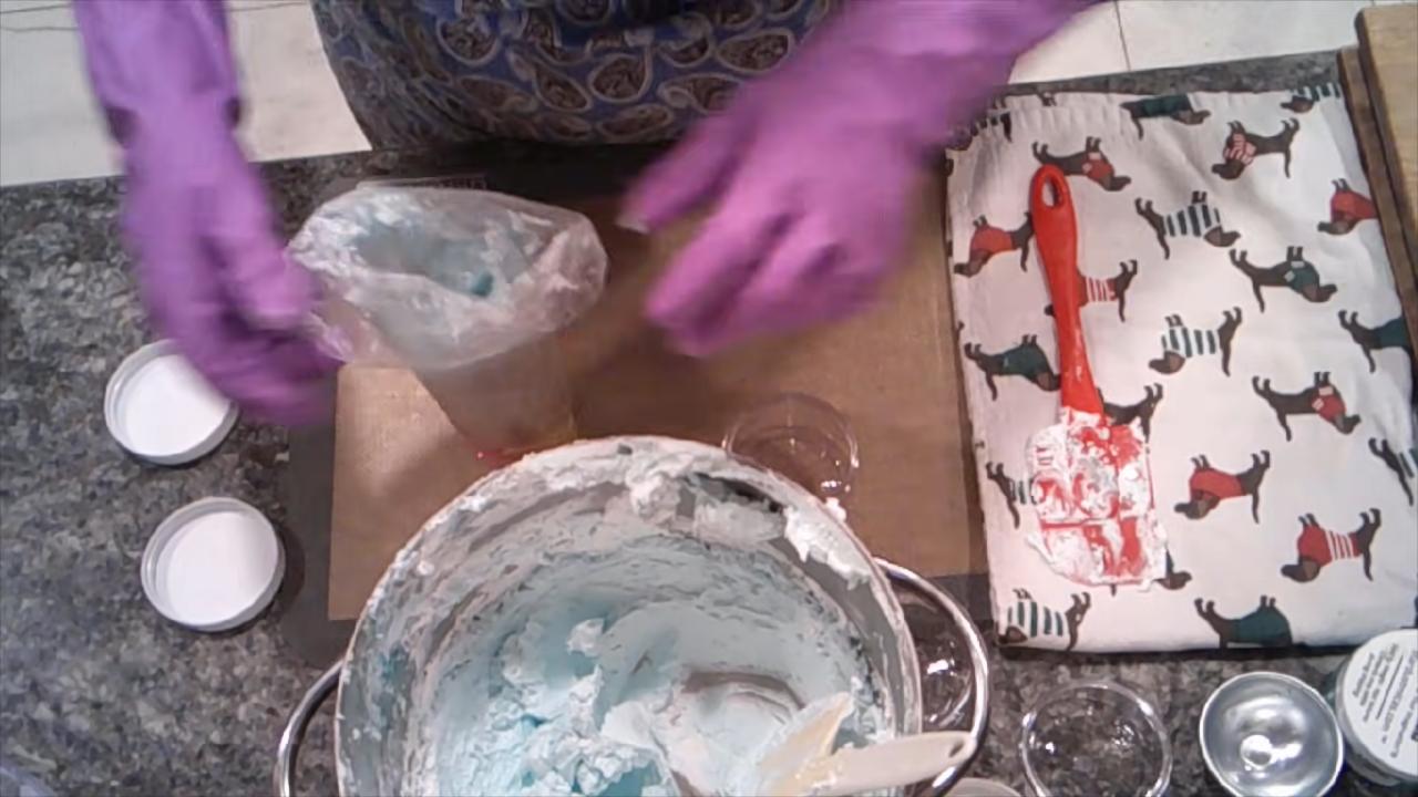Filling a piping bag with whipped soap